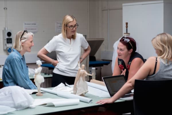 Students and staff work together during an event at London College of Fashion