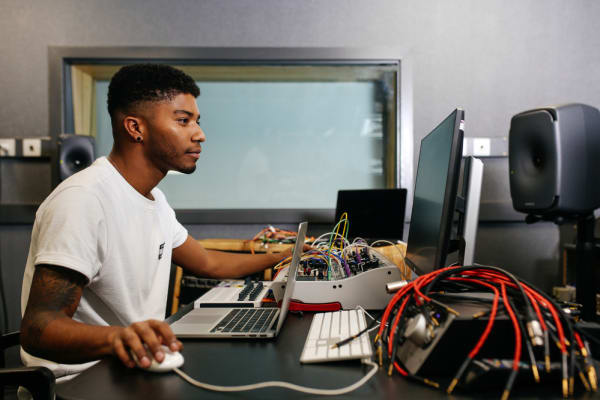 Man sitting at a desk.