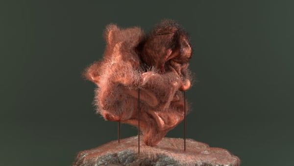 A pink fuzzy vessel held up by three supports