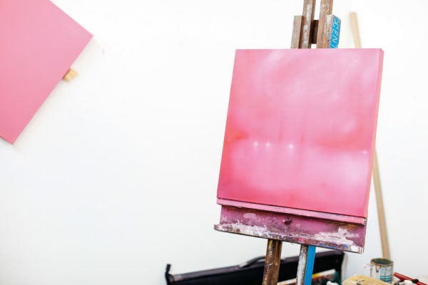 Pink canvas on easel 