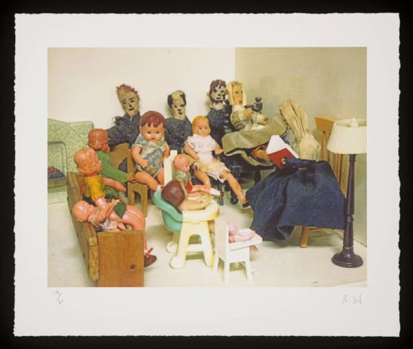sculptural installation of objects depicting a family scene