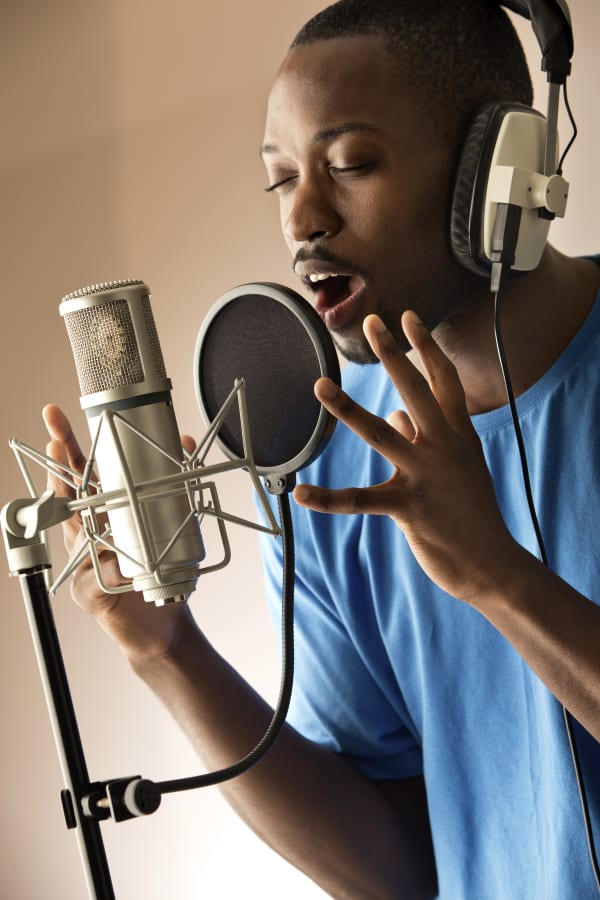 Man singing into microphone