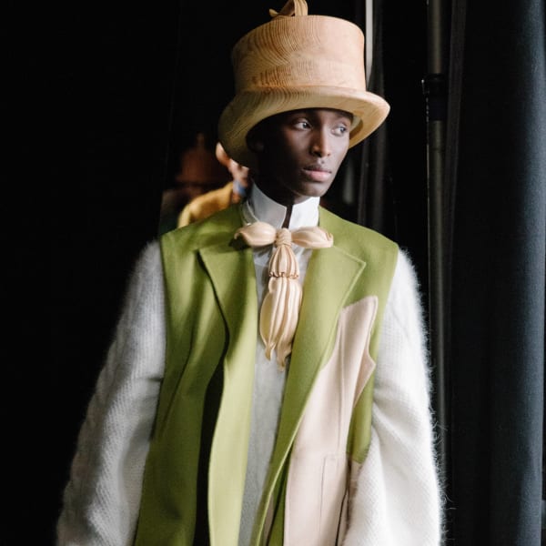 Model behind the scenes at a runway show.