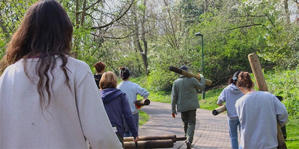 students walking through a green space