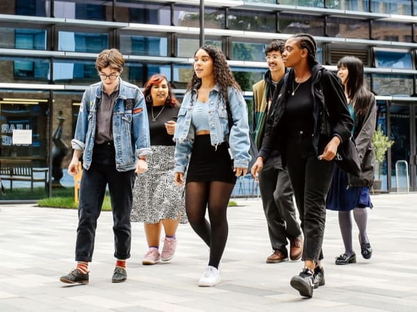 Students walking in the courtyard Camberwell College of Arts towards their hall of residence