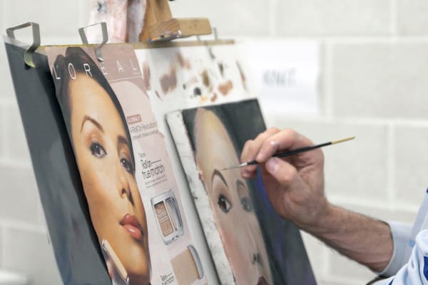 Student working on a portrait