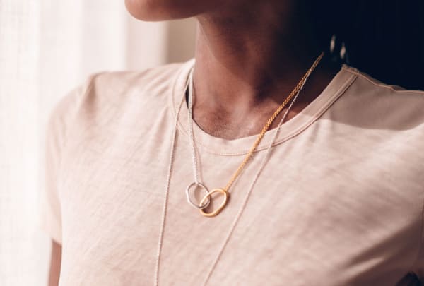 woman wearing necklaces