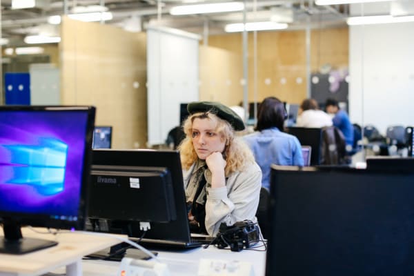 Woman sat in front of a computer