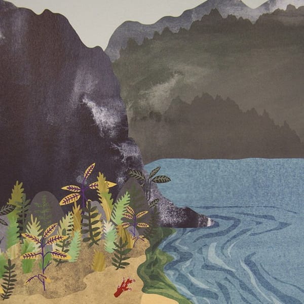 Exotic landscape, with palm trees and sea surrounded by blue mountains 