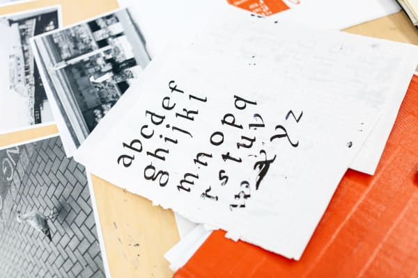 Set of prints with letters and photographs.
