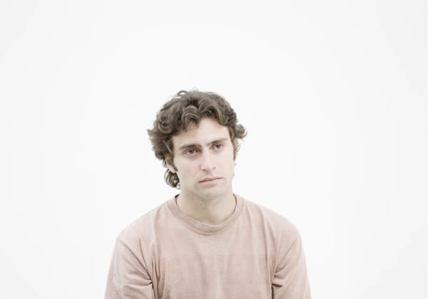 Portrait of a man against a white background