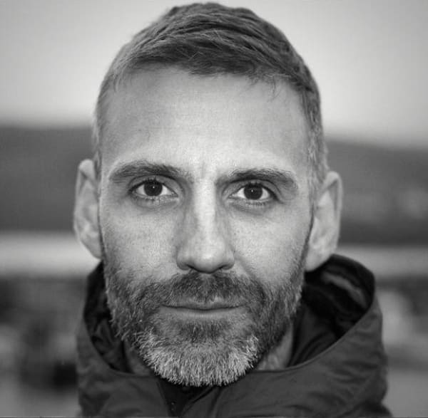 Black and white portrait of Peter Hoar looking straight at the camera