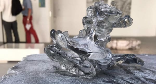 Small clear rock like sculpture