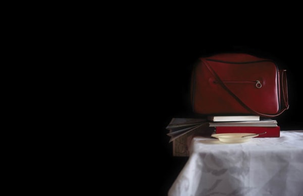 Red bag on top of a table 