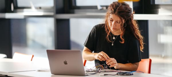 Rocio Aloe Rey working with computing components