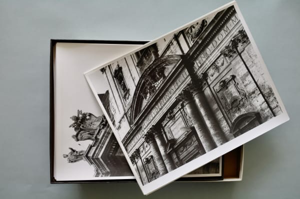 Drawers with photos and files on lettering