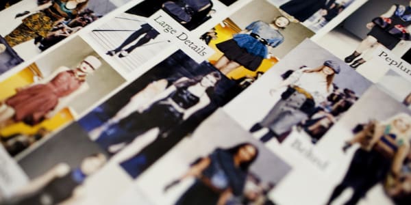 Blurred close up of a fashion magazine. The title of the page reads 