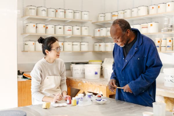 Student and Technician working in the studio