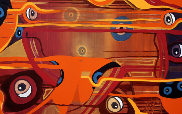 A red and brown painting including images of eyeballs