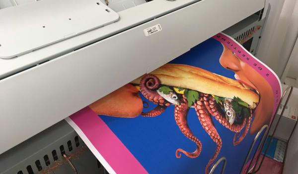People working inside the digital print workshop at Central Saint Martins