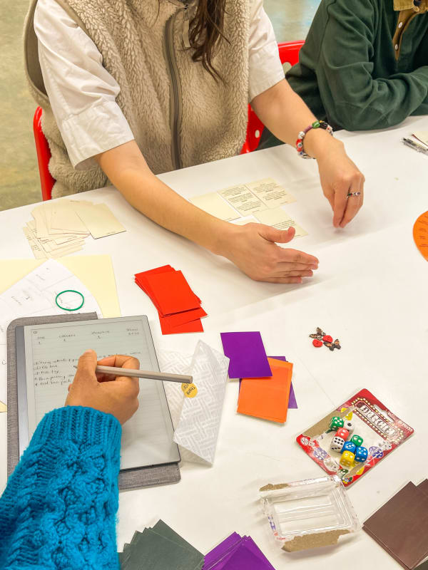 hands on a table workshop style collage