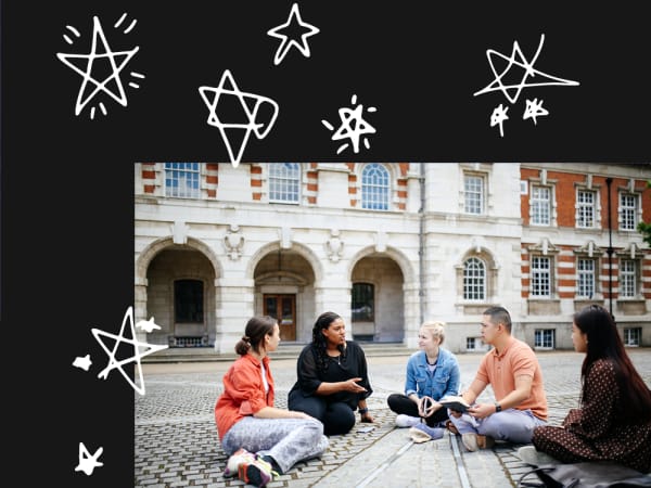 a group of people sitting on thr ground in front of the Chelsea College of Arts building
