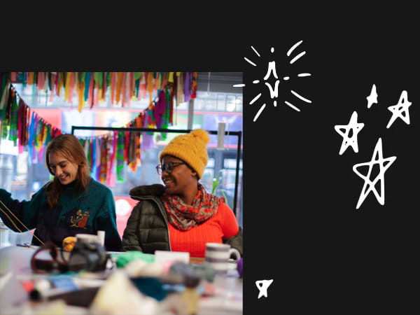 Student Jess Amaral with a workshop participant. Photo by Eugenie Flochel.