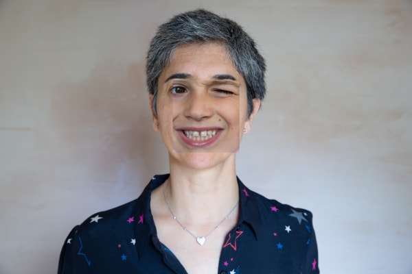 Photograph of a woman smiling