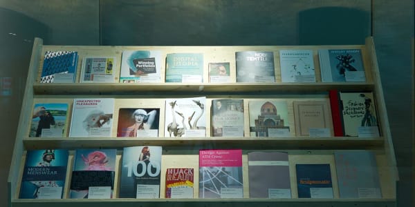 Shelves full of catalogues and books 