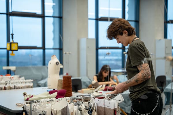 Students working in a studio at East Bank. Photography by Craig Palmer for Buro Happold.