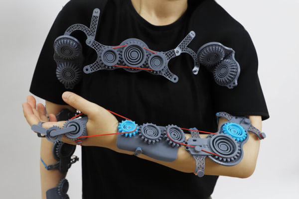 person wearing scientific arm mechanics