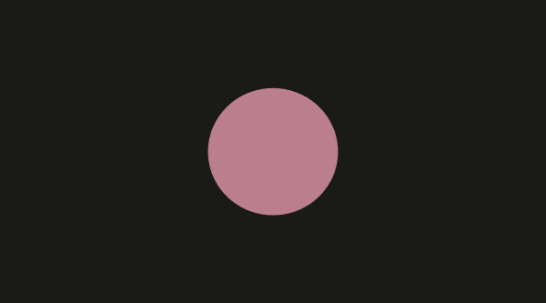 A pink circle on a black background. 
