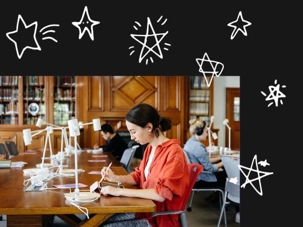 people studying at library desks