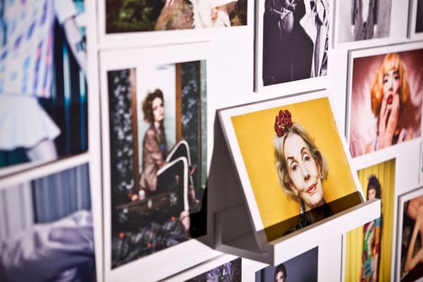 A collection of polaroid photographs on wall  taken by students at London College of Fashion