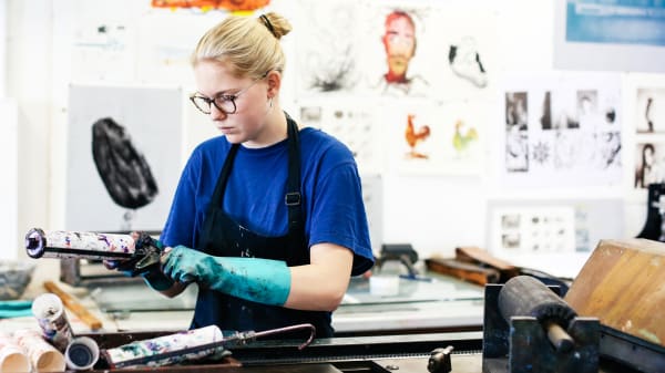 Student working in the printing workshop