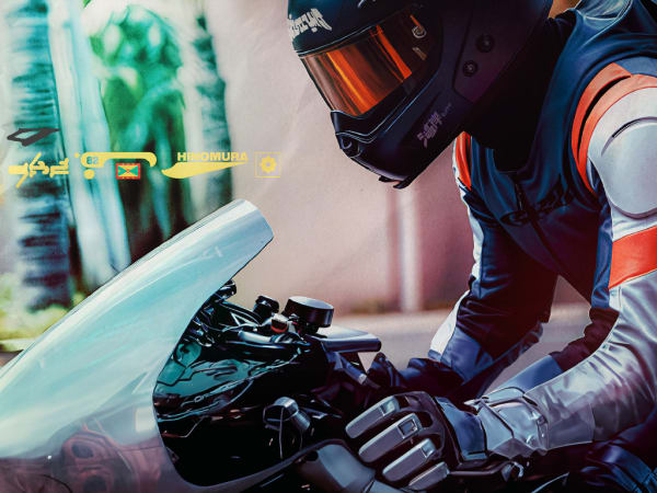 Motorcyclist riding bike.