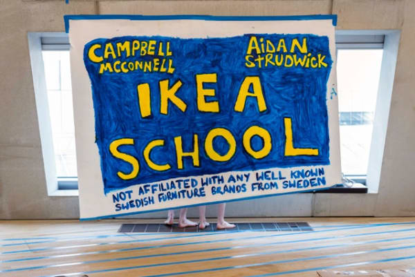 Handmade sign with 'Ikea school' written on it