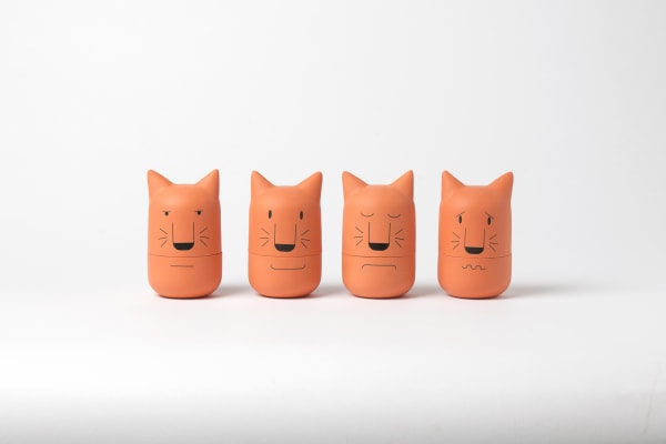 Four terracotta cat heads 