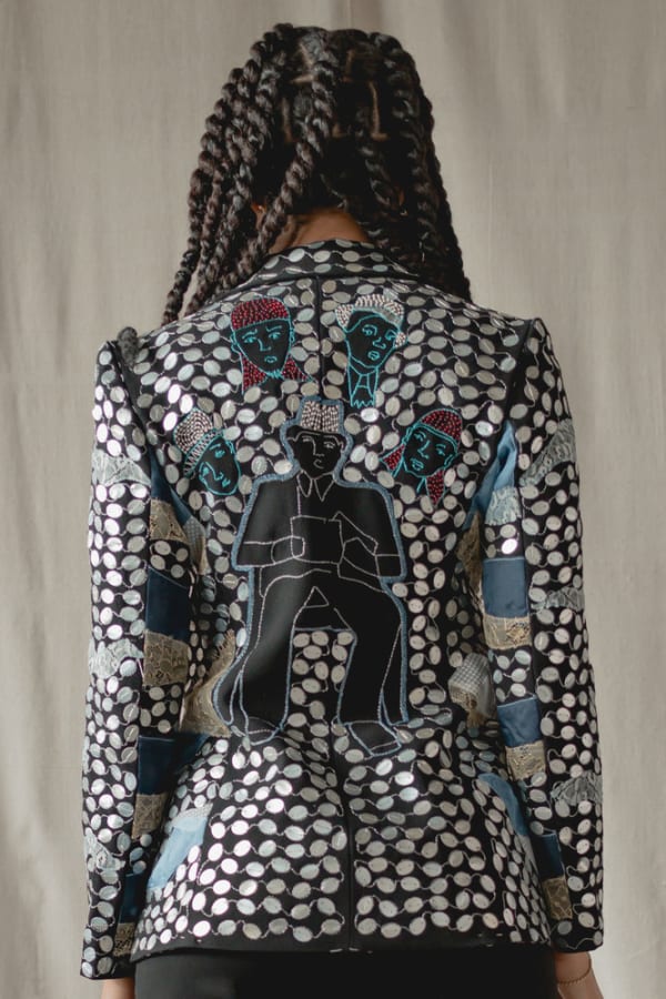 Girl in intricate sequence jacket 