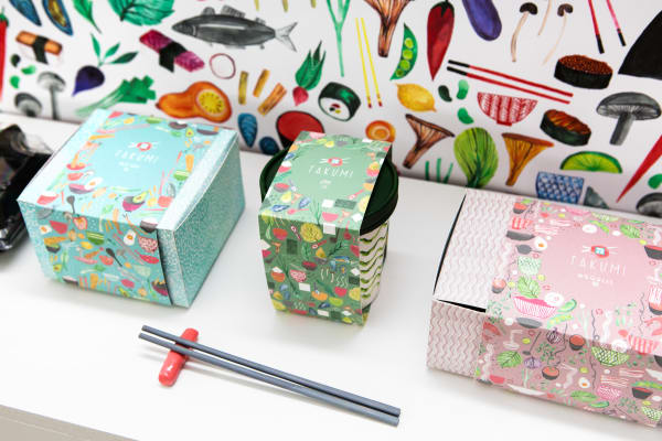 Display of 3 gift box or packaging designs with colourful prints.