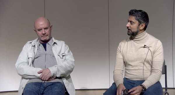 Nick Hornby and Ray Grewal seated and interacting