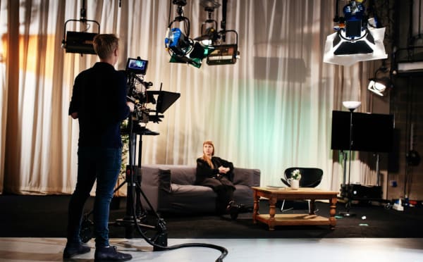 Students on set filming in the television studios