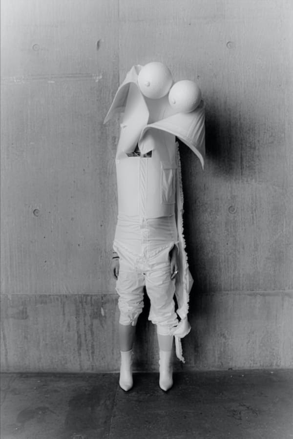 Model wearing white garments