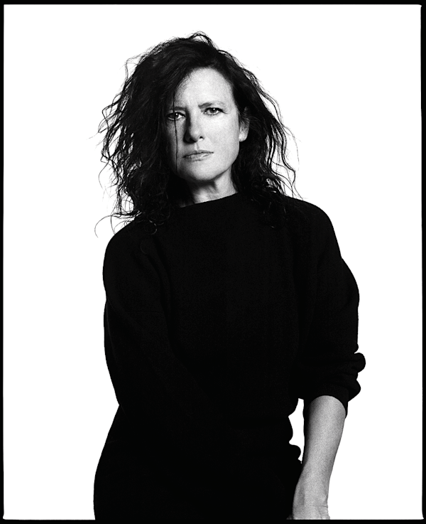 Black and white photo of a woman in a jumper