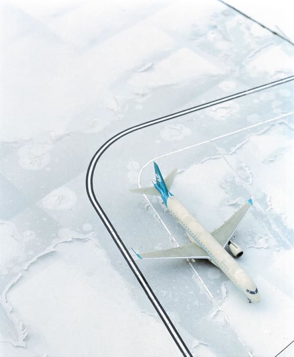 Photograph of an aeroplane in the snow