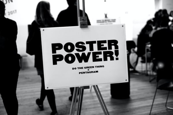 Image of a stand with the words POSTER POWER in bold
