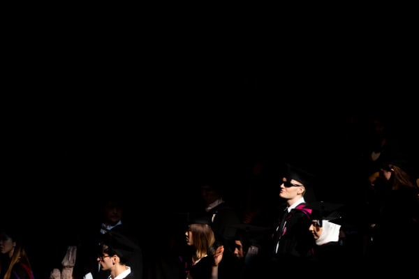 Dramatic image of graduates queueing up for their graduation ceremony 