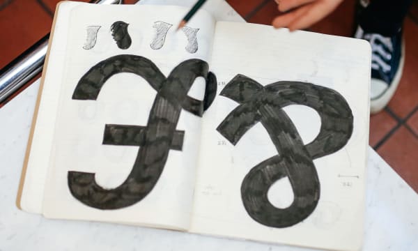 Pound and ampersand symbol in a Graphic and Media design students sketchbook