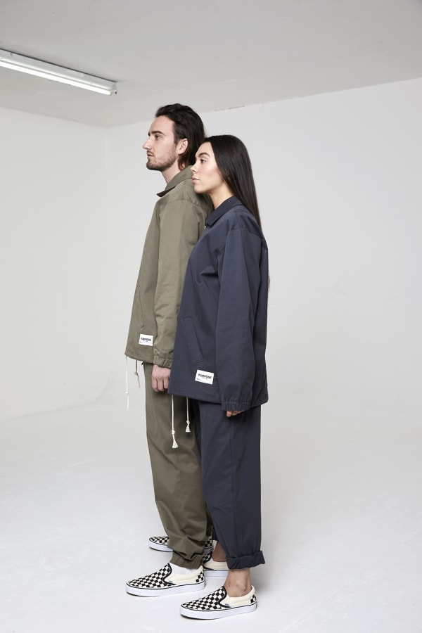 Man and woman standing in streetwear