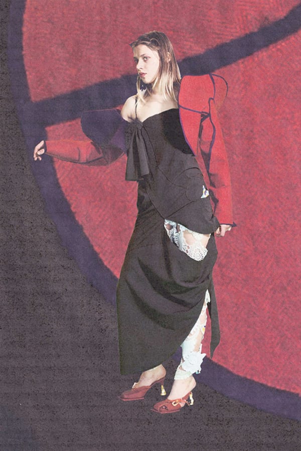 Figure wearing red garments